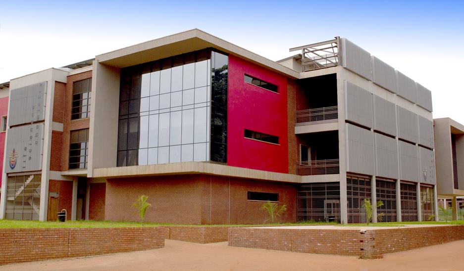 Modern University of Venda Life Sciences Building with glass facade and red accent wall
