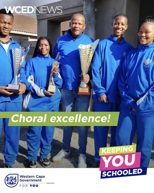 Harry Gwala Secondary School choir celebrating with trophies after success at the National Choral Eisteddfod
