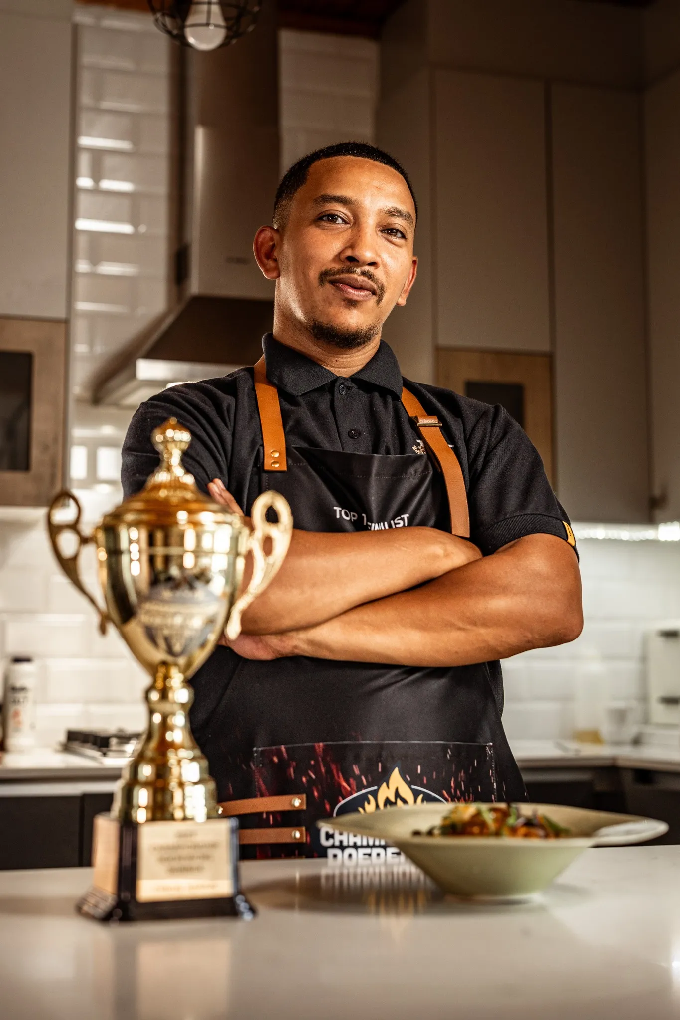 Portrait of Boland College alumnus and culinary entrepreneur Tyron Kyle Adams of Kumin & Khords